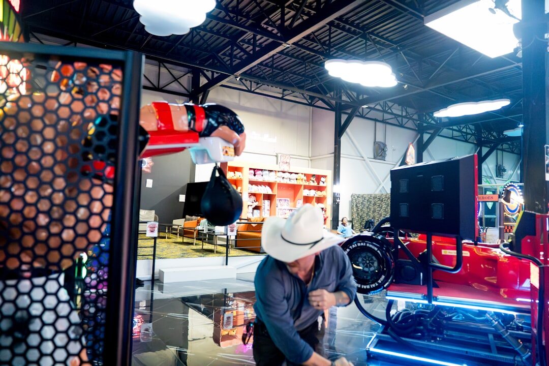 Camera crew adjusting lighting and equipment on a television set